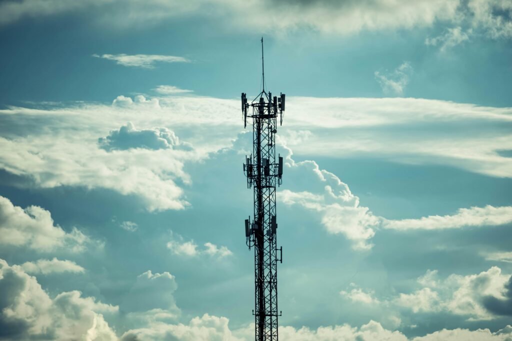 Drone Shot of a Radio Tower under a Cloudy Sky